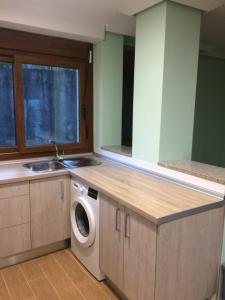 A kitchen or kitchenette at Illas Atlanticas