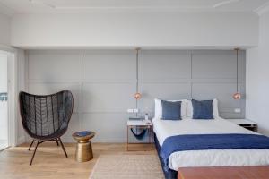 Ένα ή περισσότερα κρεβάτια σε δωμάτιο στο Regents Court Sydney