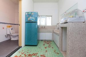 Koupelna v ubytování 512 Huts Homestay + 33 fotografií