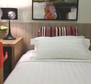 Postelja oz. postelje v sobi nastanitve Z Pad Residences