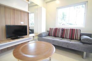 TV in/ali zabaviščno središče v nastanitvi Z Pad Residences