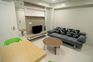 Predel za sedenje v nastanitvi Z Pad Residences