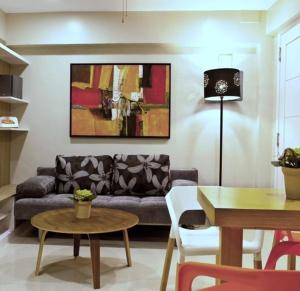 Predel za sedenje v nastanitvi Z Pad Residences
