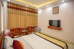 Letto o letti in una camera di Biệt thự Sao Biển - SB118 FLC Sầm Sơn Resort