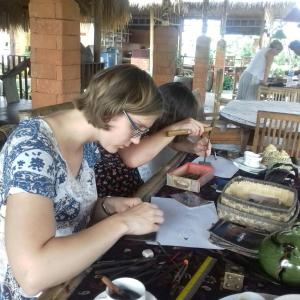 a woman and a man sitting at a table at Rice padi Artha in Ubud