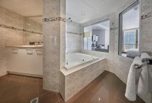 
A bathroom at Novotel Surfers Paradise
