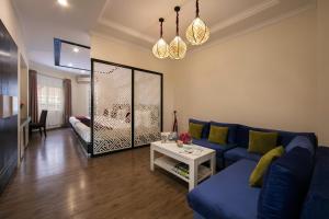Ένα ή περισσότερα κρεβάτια σε δωμάτιο στο Serenity Diamond Hotel