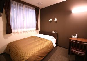 Postel nebo postele na pokoji v ubytování Hotel Trend Asakusa Annex + 20 fotografií