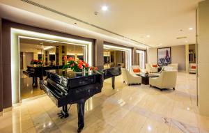 Ruang duduk di Mandarin Hotel Managed by Centre Point