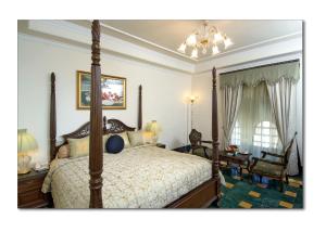 Säng eller sängar i ett rum på Shiv Vilas Resort