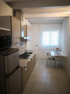 Kjøkken eller kjøkkenkrok på Villa Zen Apartment