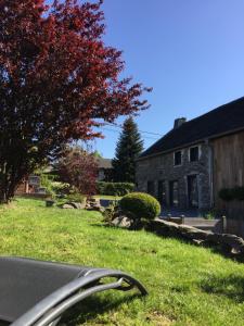 a car parked in front of a house at La maison du Lac in Spa