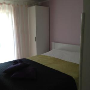 Postel nebo postele na pokoji v ubytování Guest House Villa Jadera