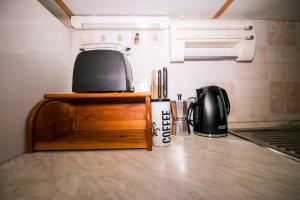 a kitchen with a counter top with a microwave at Fri Apartment in Piran +31 photos