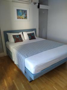 Postel nebo postele na pokoji v ubytování Sedam Bisera