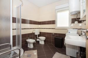 Ein Badezimmer in der Unterkunft Apartment Jusepe