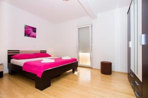 Ein Bett oder Betten in einem Zimmer der Unterkunft Apartment Jusepe