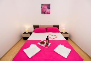 Ein Bett oder Betten in einem Zimmer der Unterkunft Apartment Jusepe