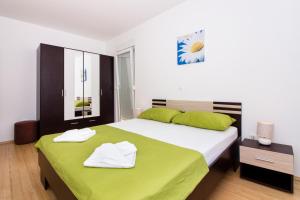 Ein Bett oder Betten in einem Zimmer der Unterkunft Apartment Jusepe