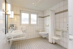 Koupelna v ubytování ibis Hotel Würzburg City