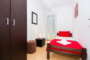Ein Bett oder Betten in einem Zimmer der Unterkunft Apartment Jusepe