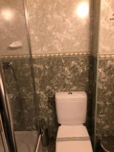 Koupelna v ubytování Hotel Condor