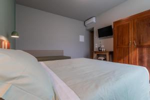 Postel nebo postele na pokoji v ubytování B&B L'Eroico