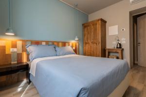 Postel nebo postele na pokoji v ubytování B&B L'Eroico