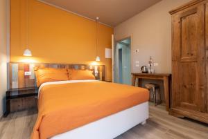 Postel nebo postele na pokoji v ubytování B&B L'Eroico