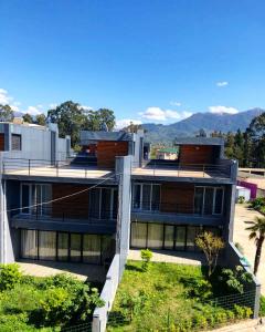 a large building with a lot of windows at Seaside cottages in Chakvi
