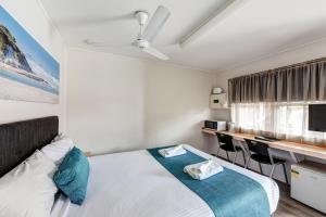 Cama ou camas em um quarto em Port Macquarie Motel