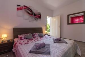 Posteľ alebo postele v izbe v ubytovaní Apartman Borna