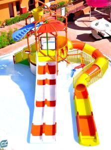 The swimming pool at or close to Rehana Royal Beach Resort - Aquapark & Spa - Family & Couples Only - Premium Ultra All-Inclusive 24H