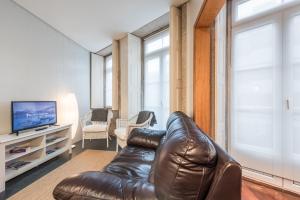 אזור ישיבה ב-GuestReady - City central suite in Porto