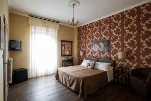 TV a/nebo společenská místnost v ubytování Hotel Residenza In Farnese