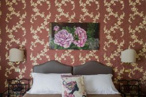 Postel nebo postele na pokoji v ubytování Hotel Residenza In Farnese
