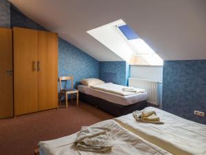 Katil atau katil-katil dalam bilik di Ferienhaus - Strandstr. 24