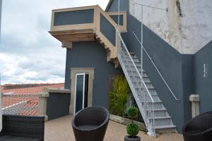 Uma varanda ou terrao em Pao 100 Pressa