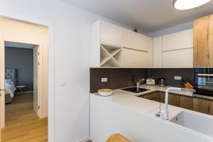 Kuchyň nebo kuchyňský kout v ubytování Perla Apartmani Split