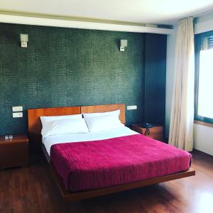 Postel nebo postele na pokoji v ubytování Motel Abalo