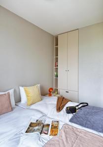 Łóżko lub łóżka w pokoju w obiekcie Arche Hotel Poloneza