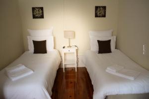 Uma cama ou camas num quarto em Pao 100 Pressa