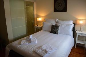 Uma cama ou camas num quarto em Pao 100 Pressa