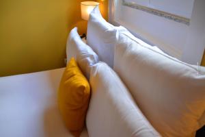 Uma cama ou camas num quarto em Pao 100 Pressa