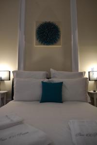 Uma cama ou camas num quarto em Pao 100 Pressa