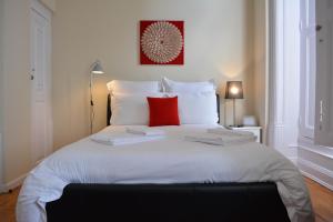 Uma cama ou camas num quarto em Pao 100 Pressa