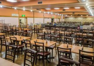 a dining hall with tables and chairs in it at Higashiyama Park Hotel Shinfugetsu in Aizuwakamatsu +42 photos