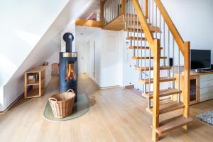 TV a/nebo společenská místnost v ubytování Winkelschiffchen I mit Sauna