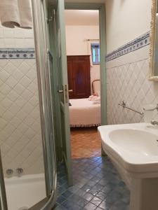 Phòng tắm tại Il Delfino