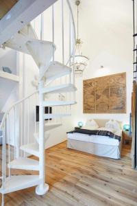 Letto o letti in una camera di Boutique Appartments AlteGreißlerei